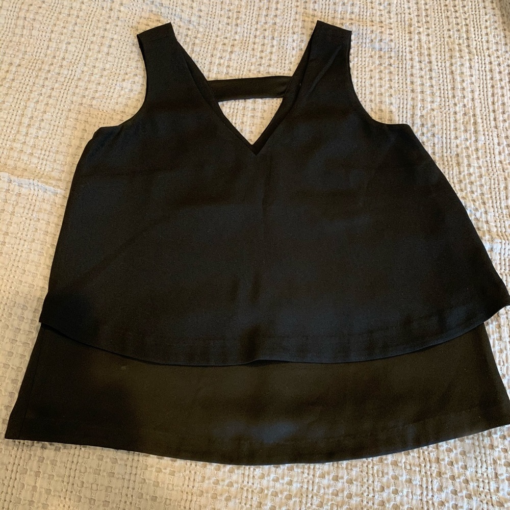 Black tiered V-neck blouse in size small